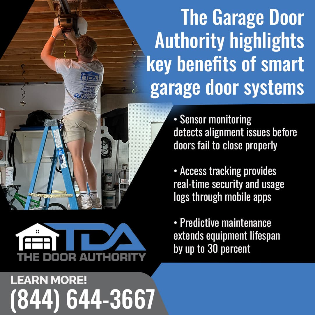 Garage door technician installing a smart garage door opener on a ceiling-mounted system, highlighting sensor monitoring and smart technology features by The Garage Door Authority.
