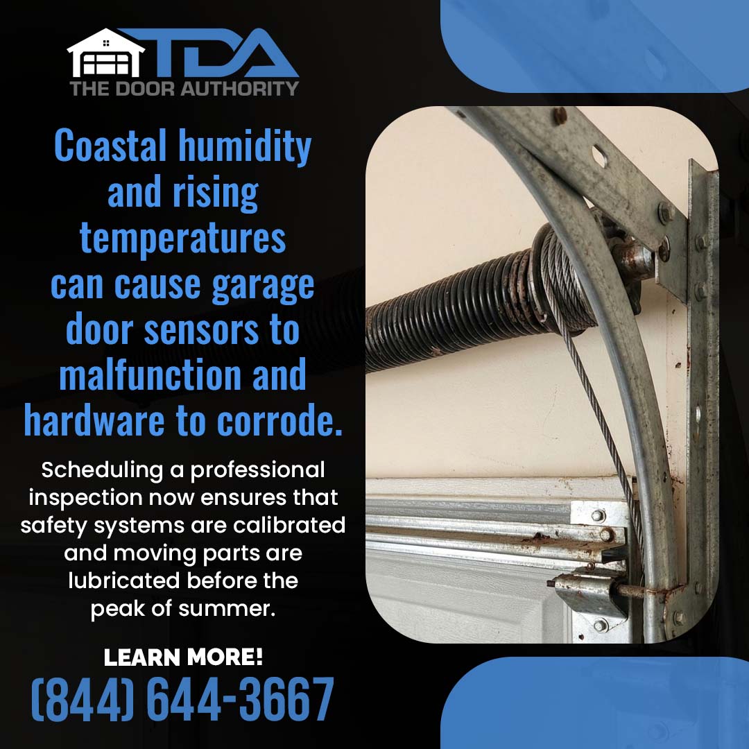 The Door Authority graphic showing a corroded garage door spring and cable, warning that coastal humidity and rising temperatures can cause sensor malfunctions and hardware corrosion.
