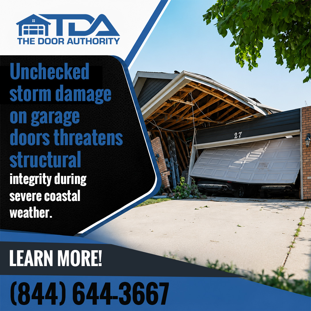 Severely damaged residential garage with a collapsed roof and bent white overhead door following a storm.